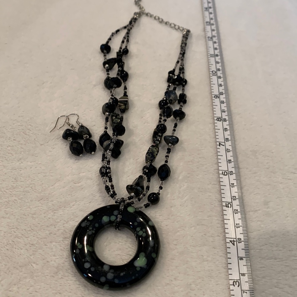 Black and green beaded necklace with matching earrings
